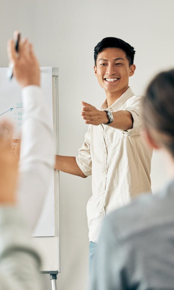 businessman-doing-a-presentation-in-a-meeting-with-2023-11-27-05-30-15-utc.jpg